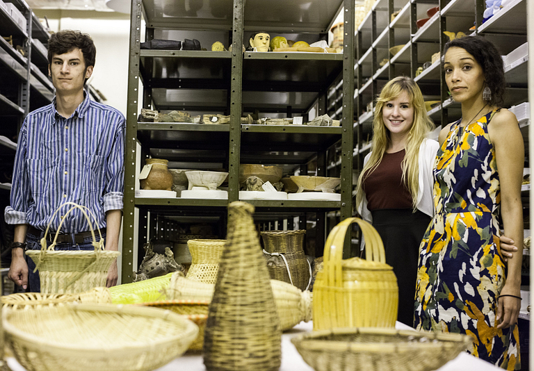 Clowes Internship Program participants Ethan Miller, Maggie Slaughter and Kaila Austin in collection