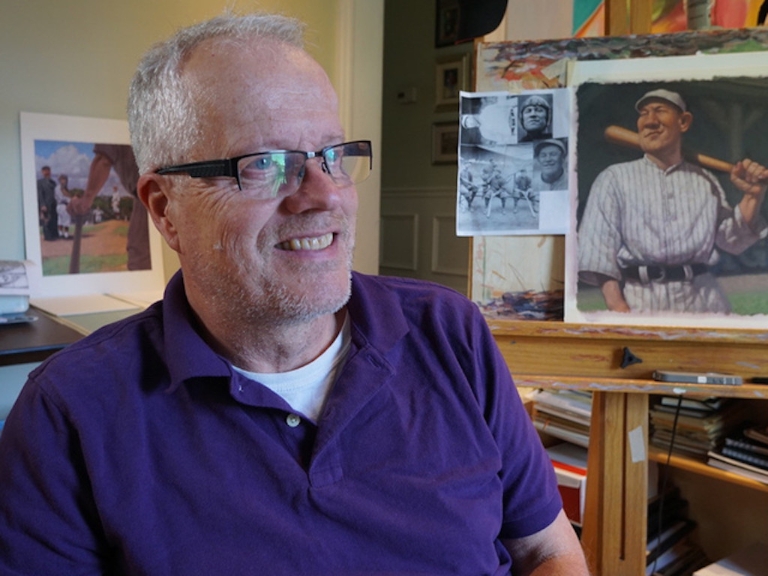 Artist C.F. Payne in his studio