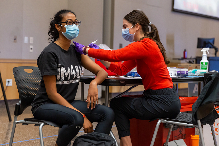 An IUPUI student receives the COVID-19 vaccine on campus.