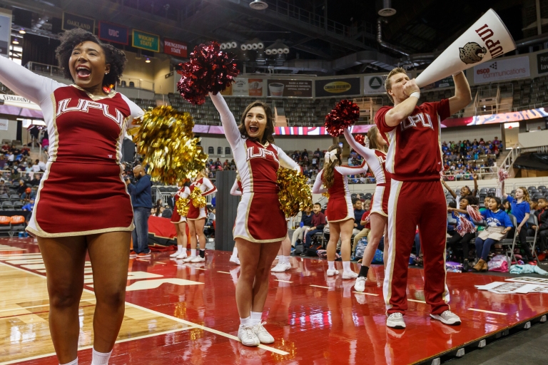 IUPUI cheerleaders get the crowd pumped up for a game.