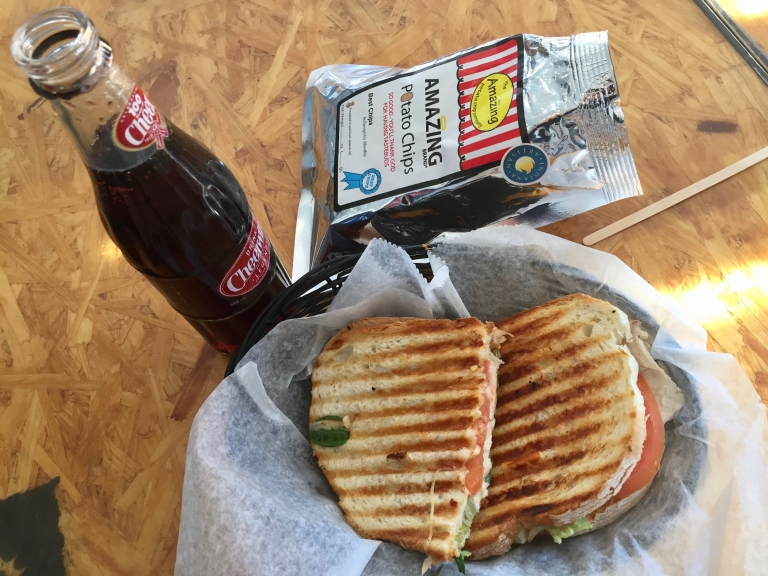 A sandwich, chips and soda from Foundry Provisions