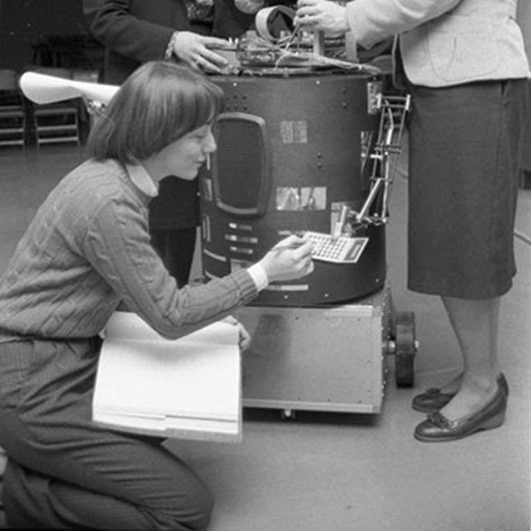 Students with a robot in 1984