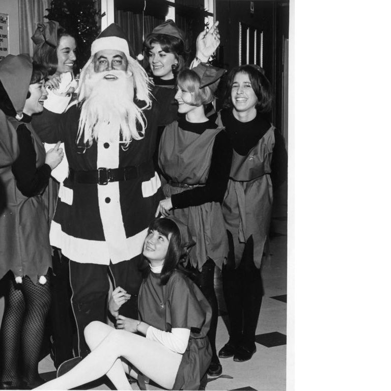 Herman B Wells dressed as Santa