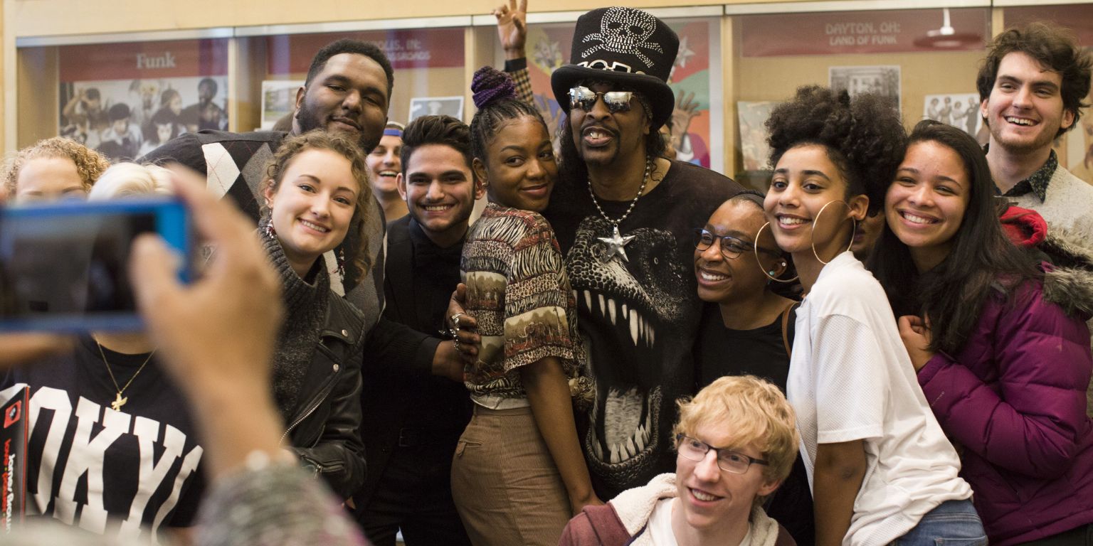 Bootsy Collins poses with students