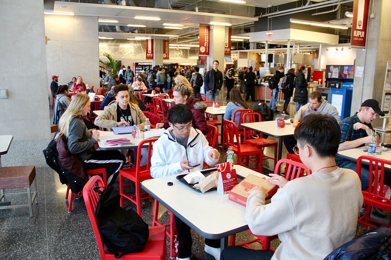 Students sit in the Campus Center.