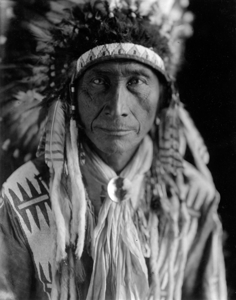 A portrait of an Assiniboine man