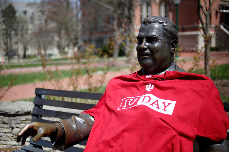 The Herman B Wells statue wearing an IU Day shirt