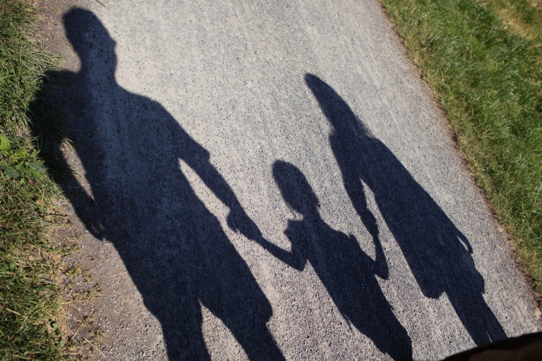 Silhouette of parents and child 