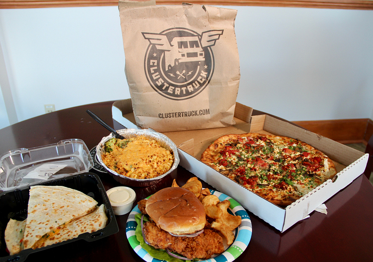 Orders from ClusterTruck, from left: quesadillas, macaroni and cheese, chicken sandwich, and pizza.