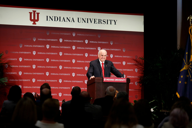 IU President McRobbie at a podium