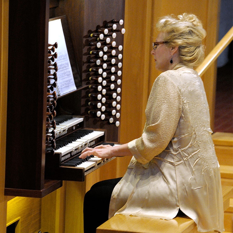 Fishell is playing the organ