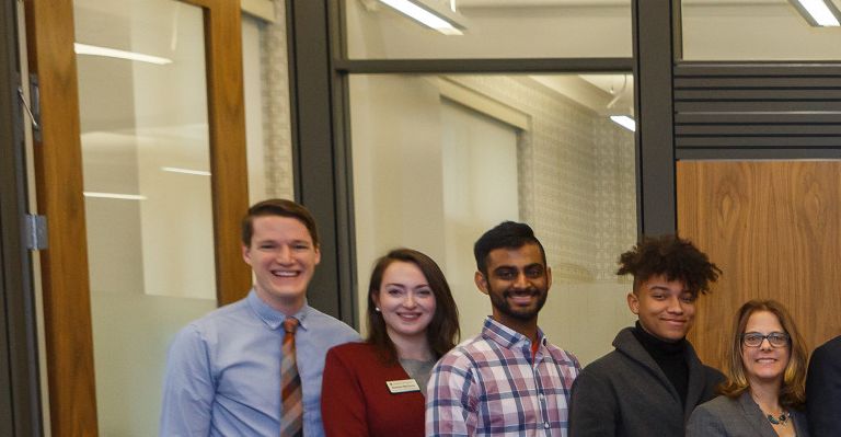 U.S. Surgeon General Jerome Adams poses with IU leaders and students