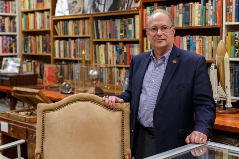 Jonathan Eller stands in the Center for Ray Bradbury Studies.