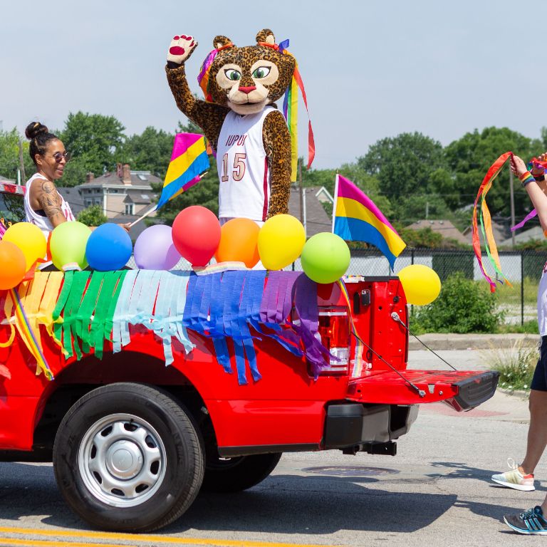 Jazzy rides in the IUPUI Pride float.