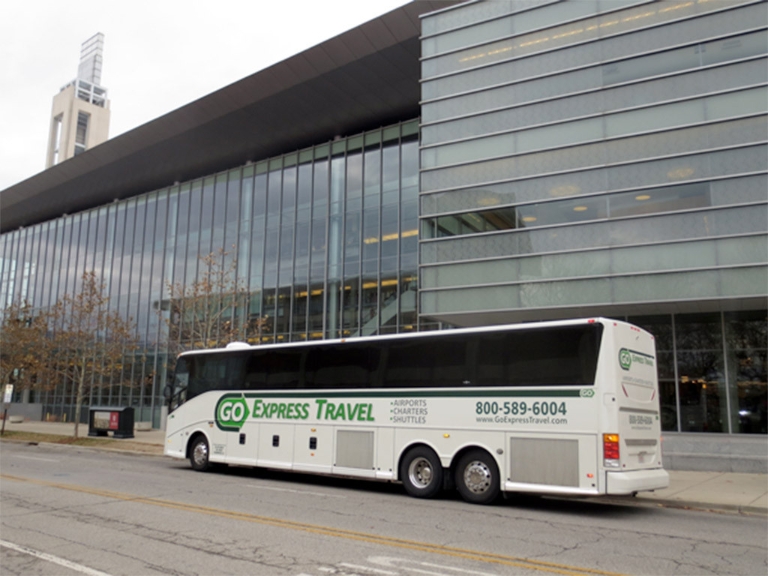 Campus Commute shuttle in front of Campus Center