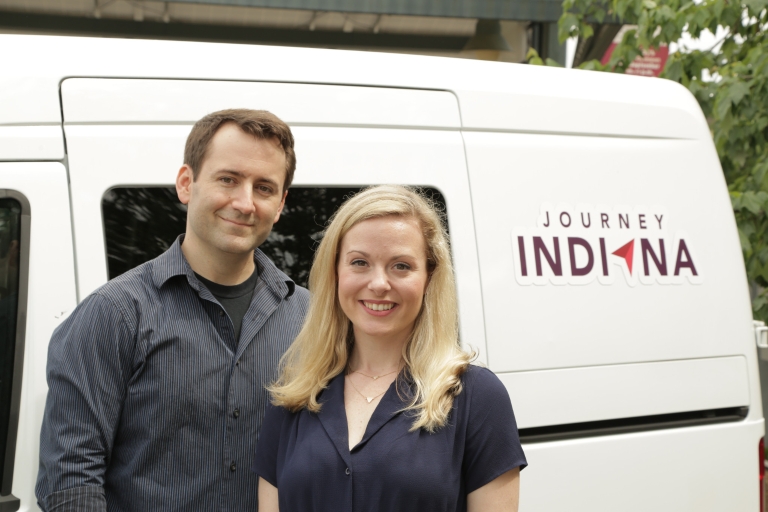 Hosts Ashley Dillard and Brandon Wentz with their travel van. 