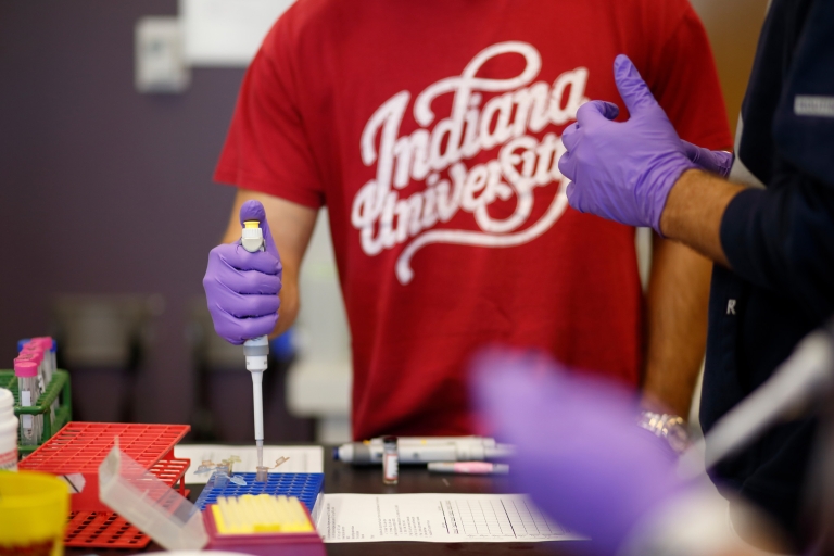 IU students conduct research in a chemistry laboratory