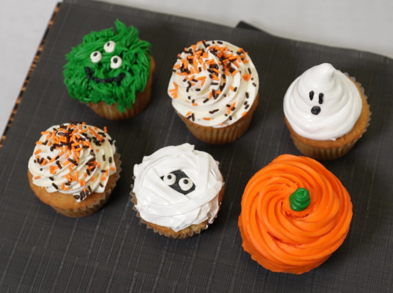 cupcakes with Halloween decorations