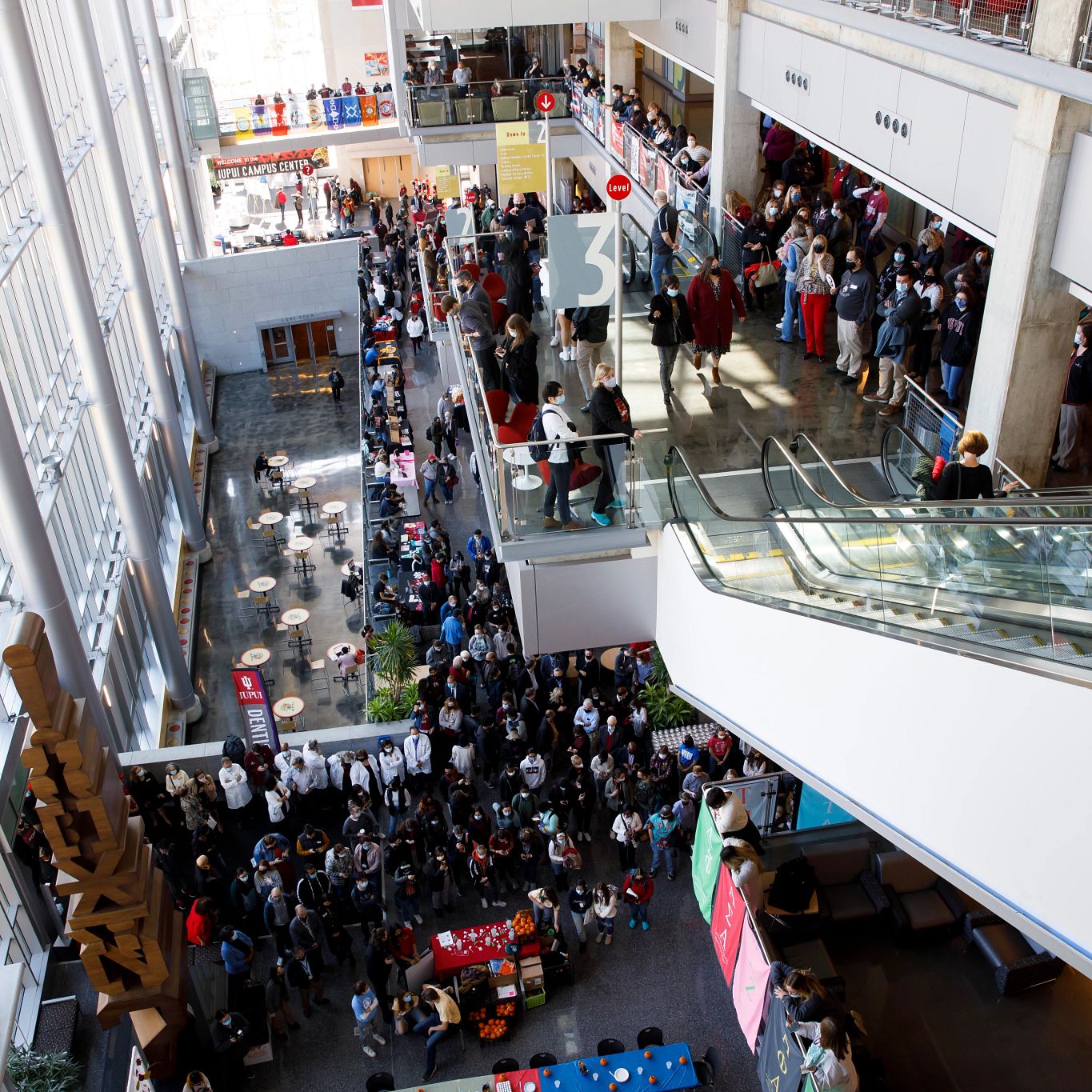 An overhead view of students filingl the Campus Center