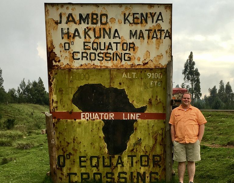 Neil Flick stands at the equator.