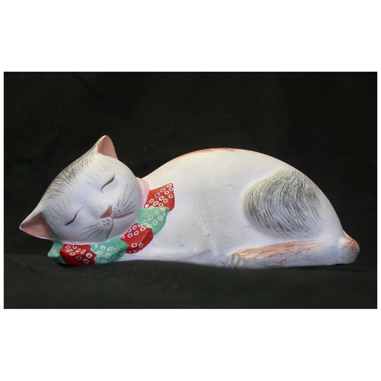 Ceramic Japanese figurine of a sleeping cat