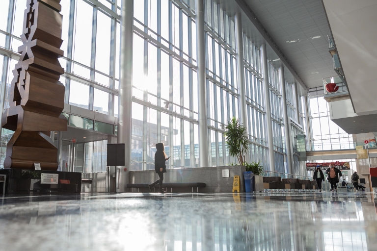A student walking in the Campus Center