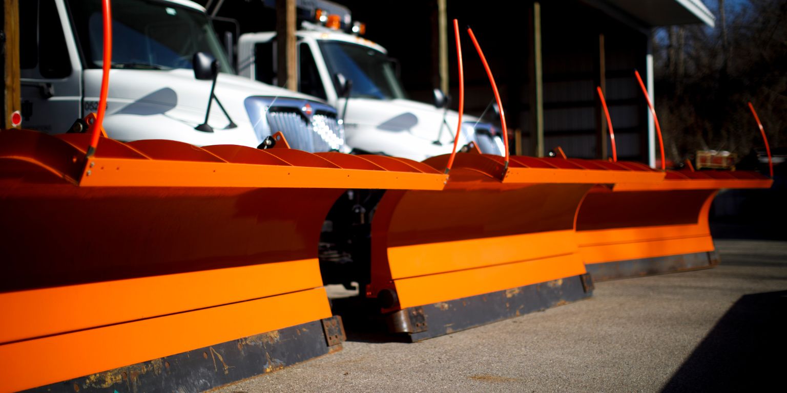 Trucks with snow plows