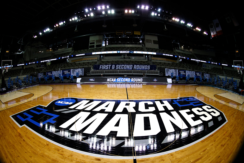 a wide-angle view of the NCAA basketball court