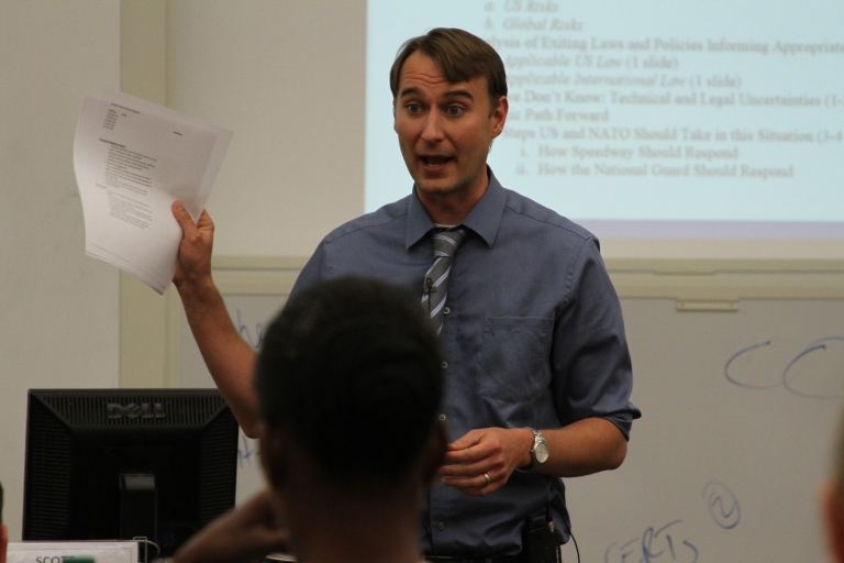 Professor Scott Shackelford lectures to a classroom
