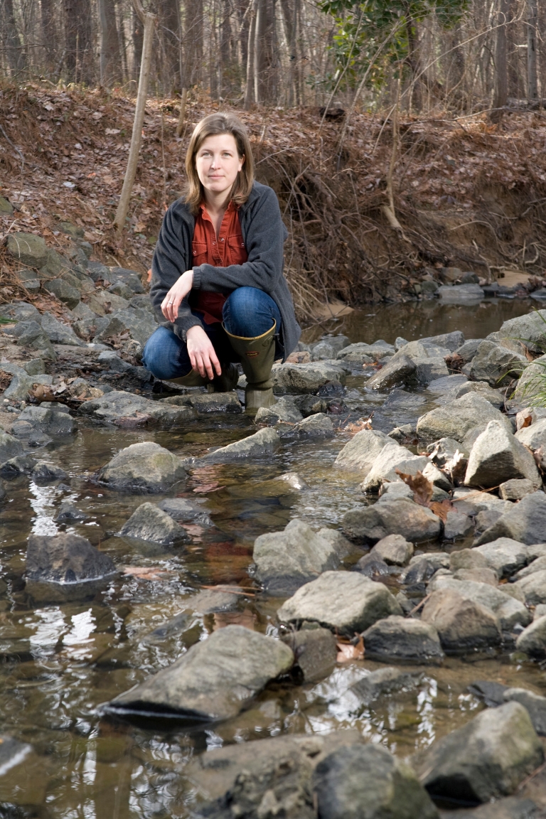 Emily Bernhardt by a stream