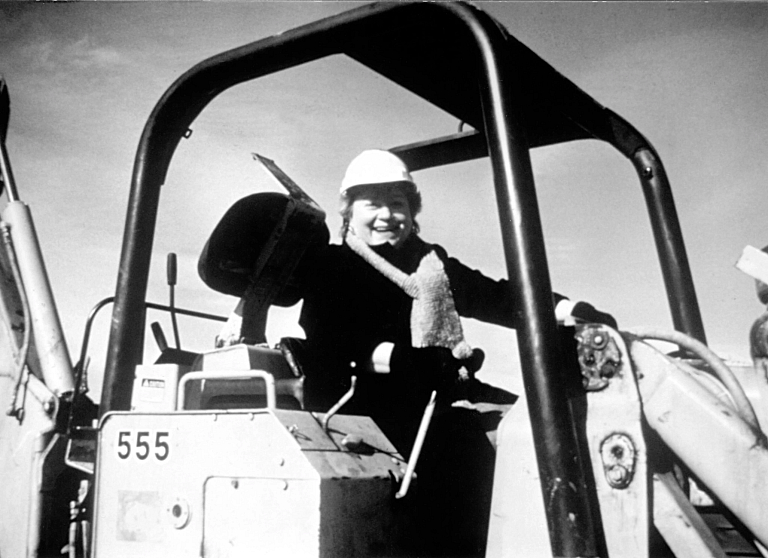 Angela Barron McBride on a bulldozer