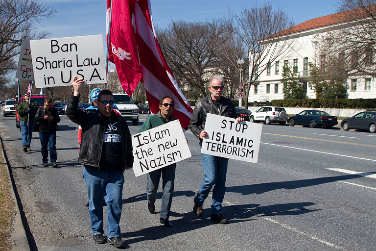 Pastor Terry Jones marches with two other men during a protest in Washington, D.C., in 2011.