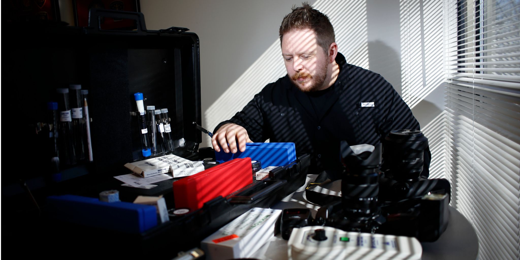 Levi Minnick with his crime scene investigation tools