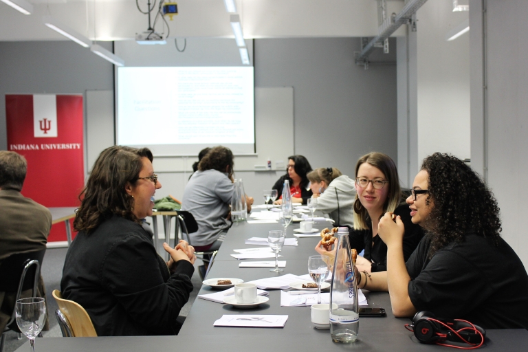 People talking at a table