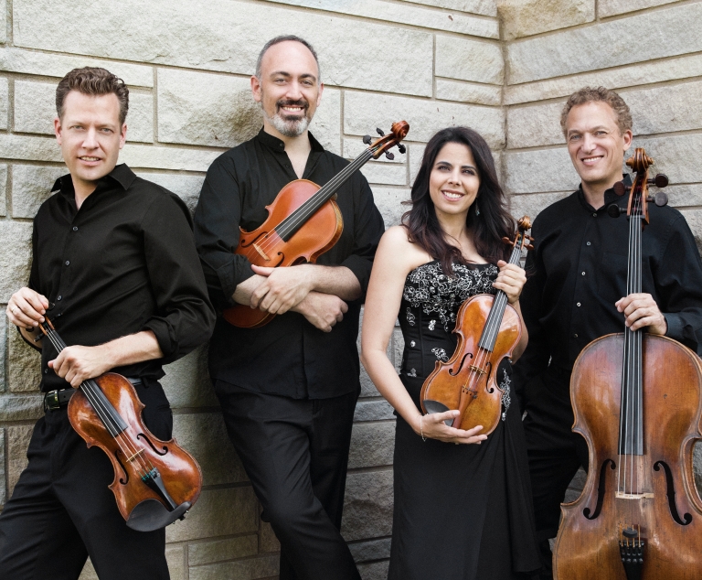 Members of the Pacifica Quartet with their instruments