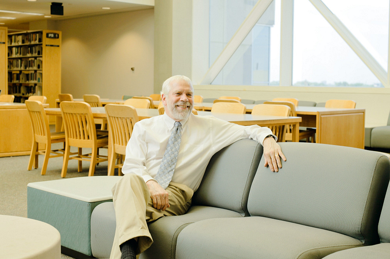 David Lewis in library