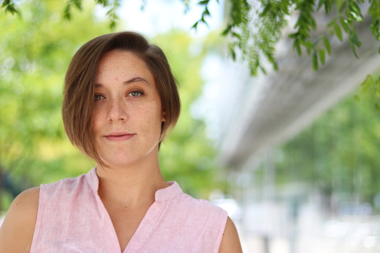 Noelle Luling poses for a photo on campus to be included in the Recovery Month exhibit at IUPUI.