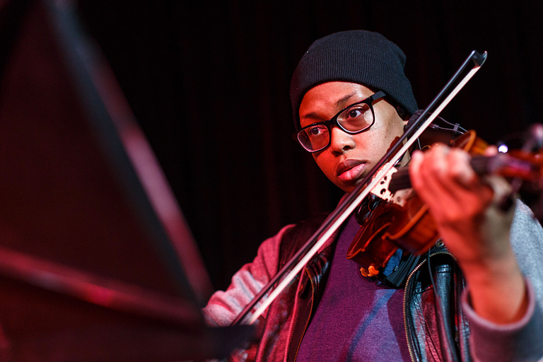 A student plays violin.