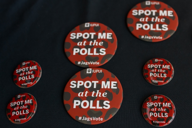 buttons that read 'Spot me at the polls' with an IUPUI logo on them