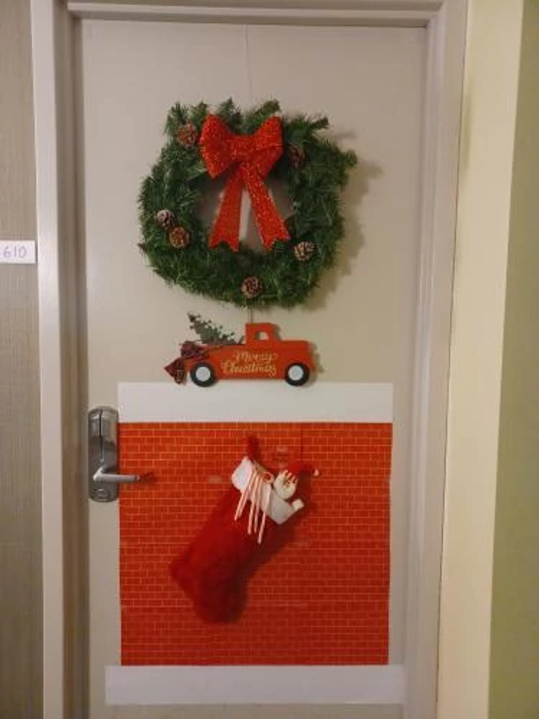 door with wreath and truck