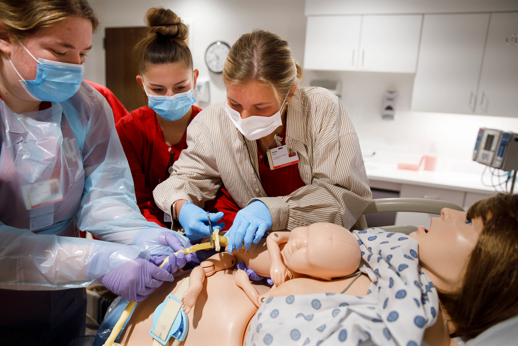 Students learn during a labor and delivery simulation