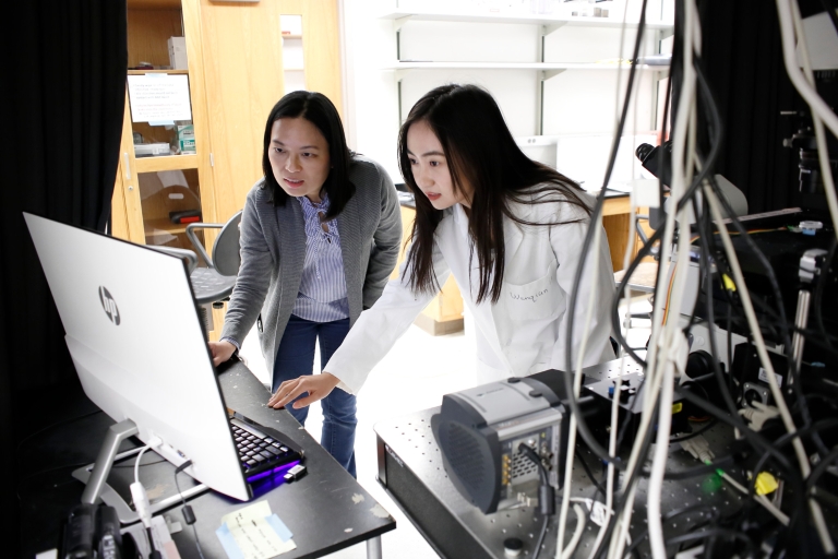 Yan Yu and Wenqian Li in the lab