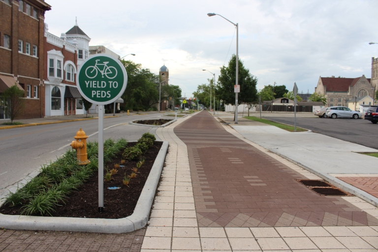 A brick sidewalk and bicycle path in downtown Richmond, Indiana.