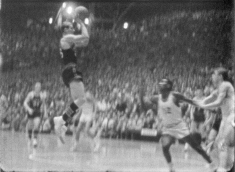 A scene from one of the 1954 basketball games featuring Milan High School.