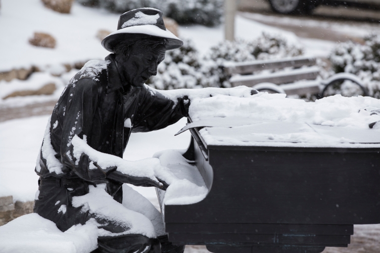 Hoagy Carmichael statue covered in snow