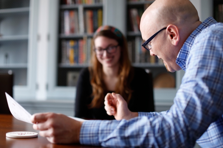 A student working with an advisor