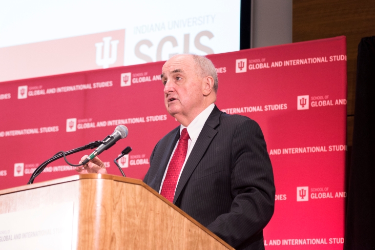 IU President Michael A. McRobbie standing at the podium