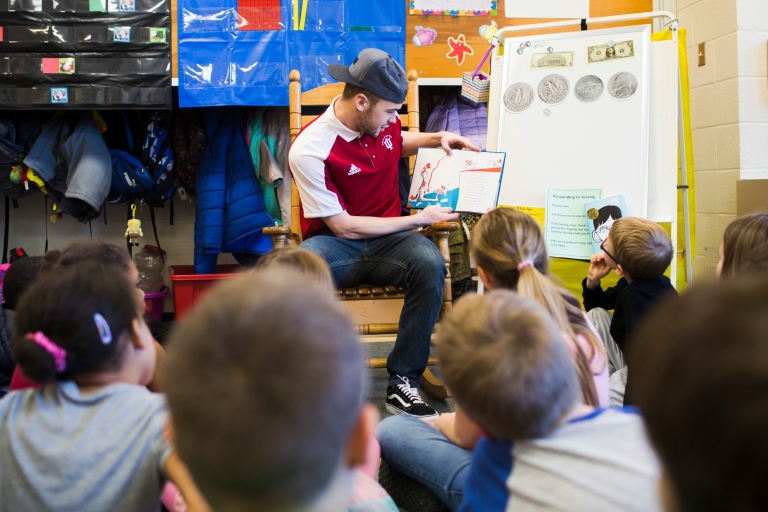 IU athletes take part in Read Across America.