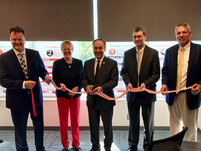 Chancellor Nasser Paydar and other IUPUI dignitaries attend a ribbon cutting