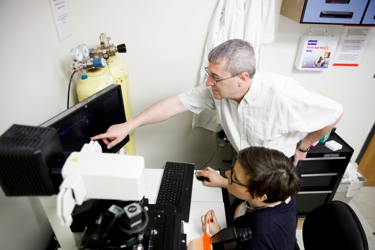 Amelia Randich and Yves Brun in the lab